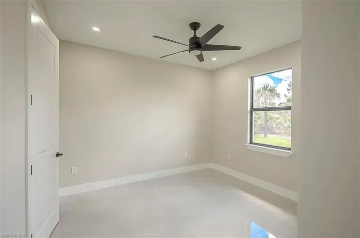 Spare room featuring ceiling fan