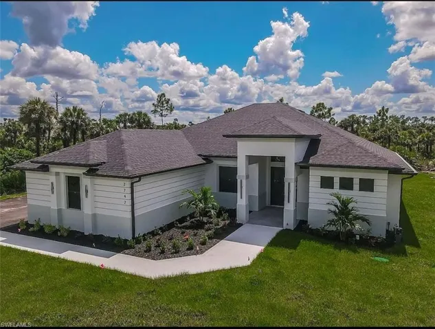 View of front of home with a front yard