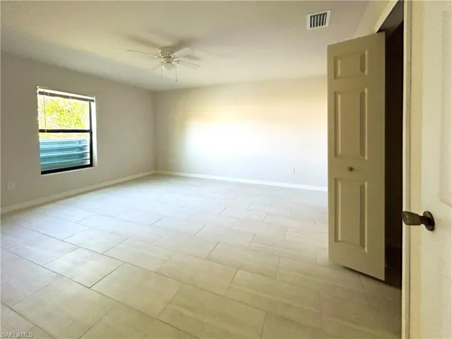 Unfurnished room with ceiling fan