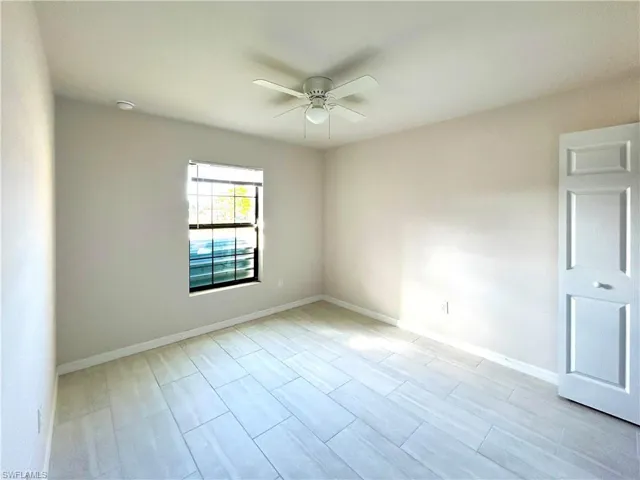 Spare room featuring ceiling fan