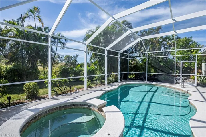 Pool and spa with beautiful landscaping