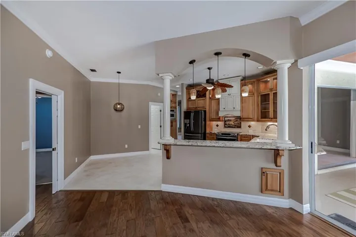 Kitchen with breakfast area looking from family room