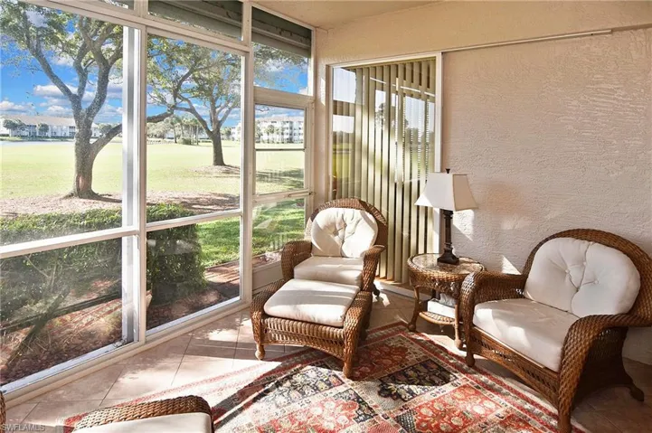 Sunroom / solarium with view of golf course