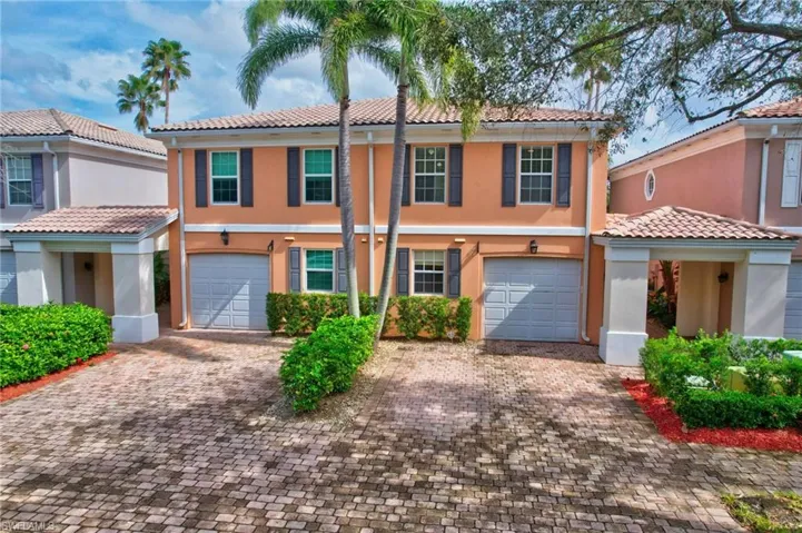 Mediterranean / spanish-style house featuring a garage