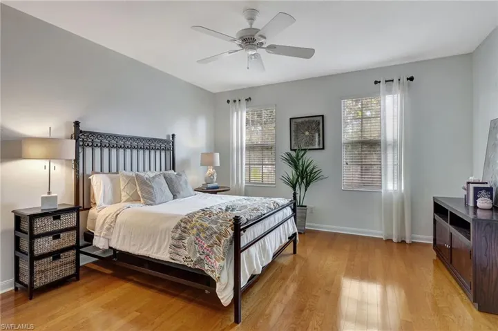 Bedroom featuring light hardwood / wood-style flooring and ceiling fan