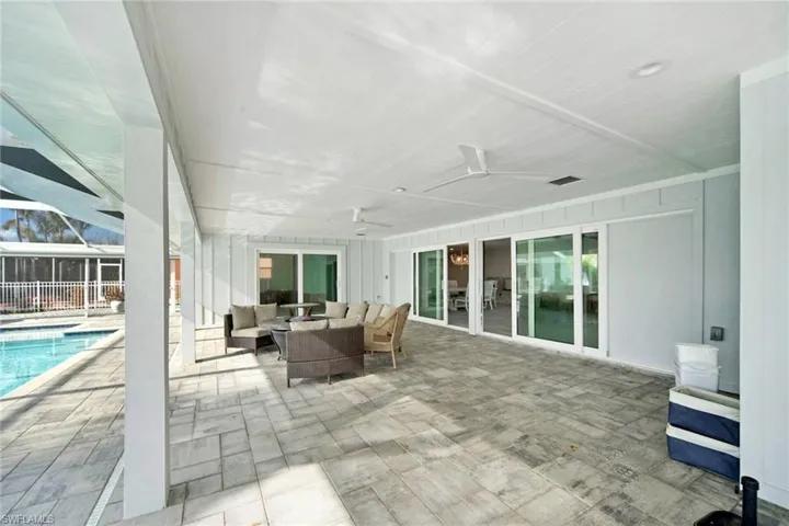 View of patio featuring ceiling fan and an outdoor hangout area