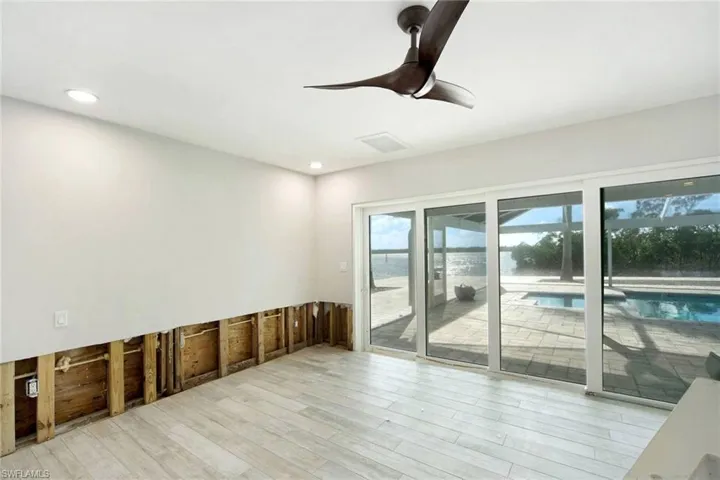 Spare room featuring light hardwood / wood-style floors and ceiling fan