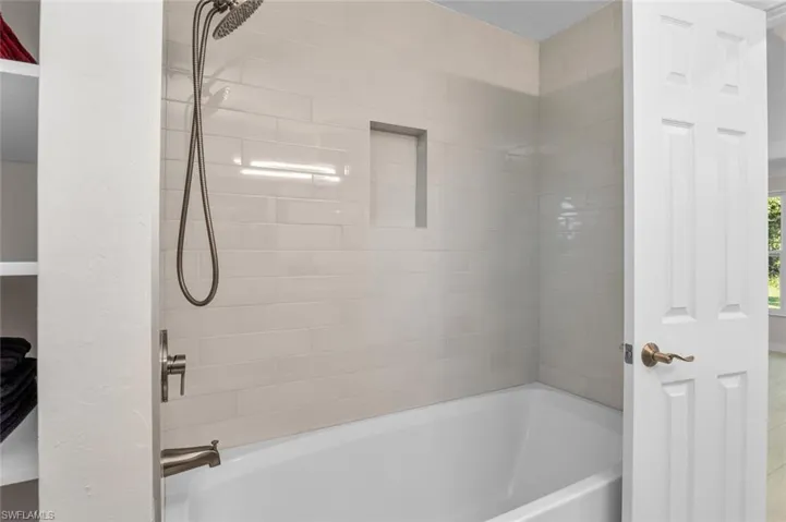 Over-sized bath / shower combo - new subway tiles