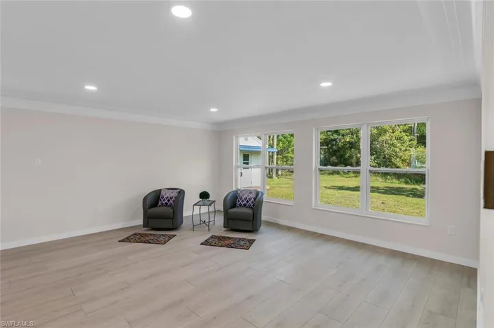 Lots of natural light, ornamental molding