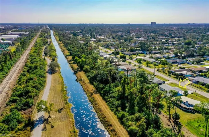 Woods and Canal behind the house. John Yarbrough Linear Park Trail. Drone / aerial view
