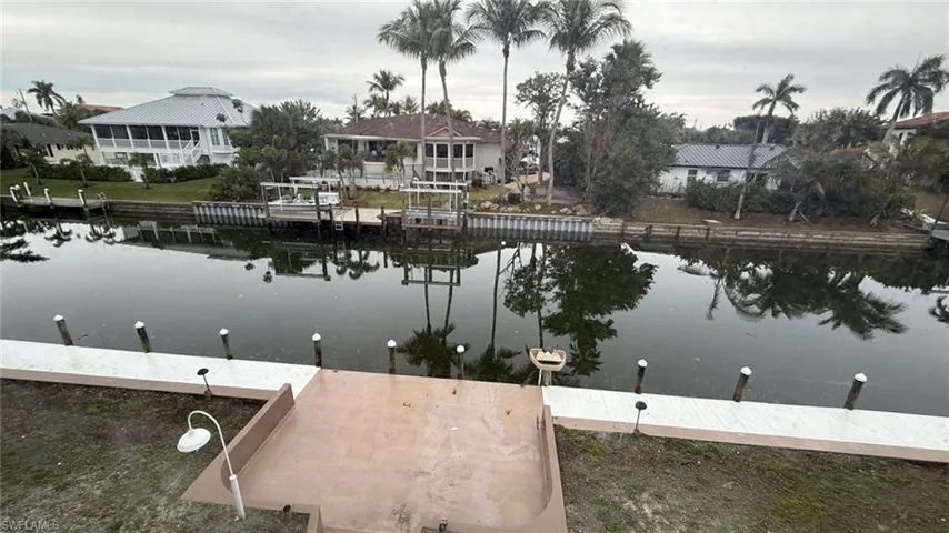 Dock featuring a water view