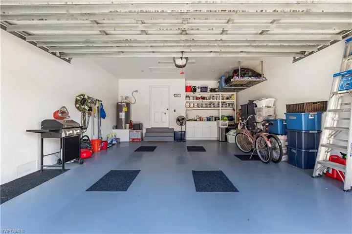 Garage with extra shelving.