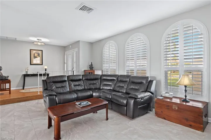 Living area featuring baseboards