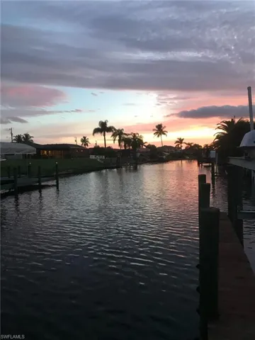 Water view featuring a dock