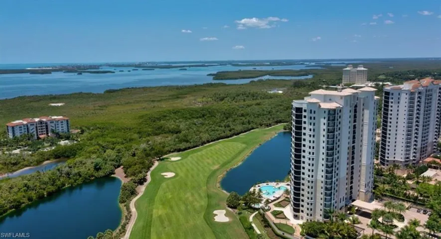 Aerial view of a large body of water and a golf club
