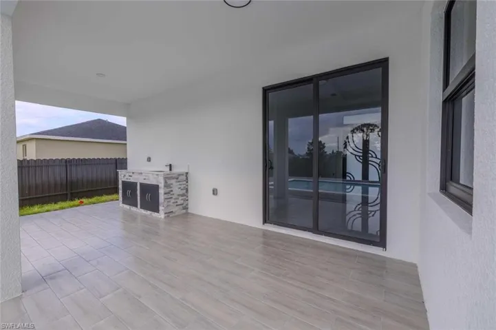 View of patio / terrace featuring fence