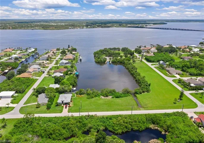 Aerial view of residential area with a large body of water