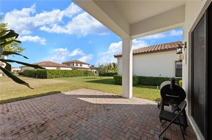 View of patio featuring area for grilling