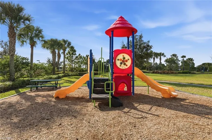 Communal playground featuring a lawn