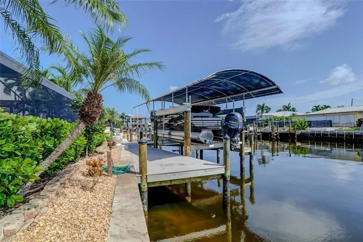 Covered lift on waterfront canal