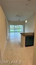 Hall featuring baseboards