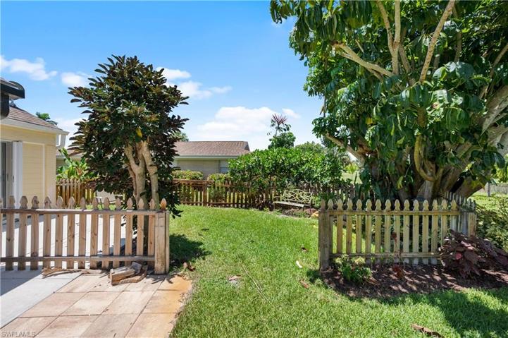 Part of backyard that is fenced in for a dog area.