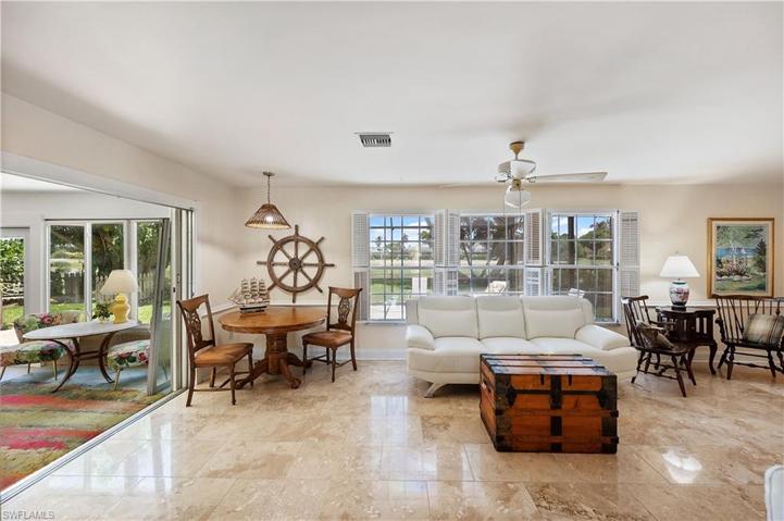 Sitting area with bright and cheery natural light throughout.