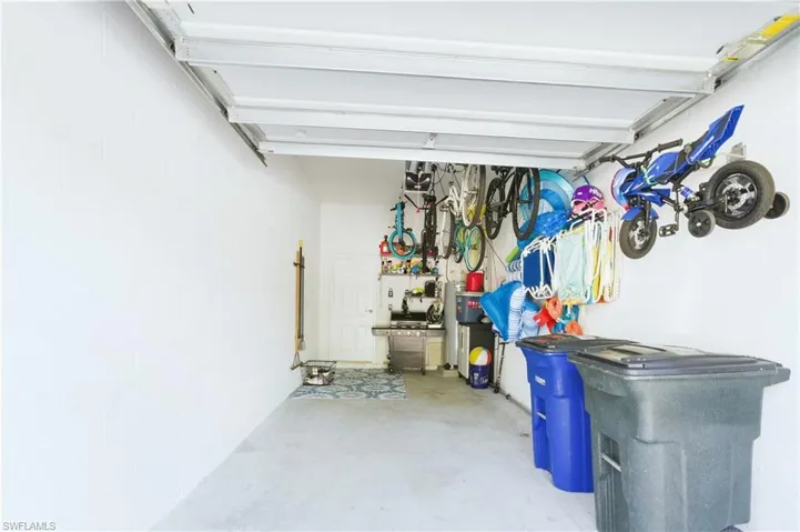 Attached 1 car garage with overhead storage