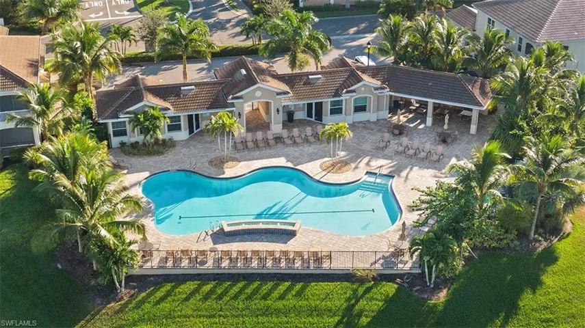 Community pool with a patio area
