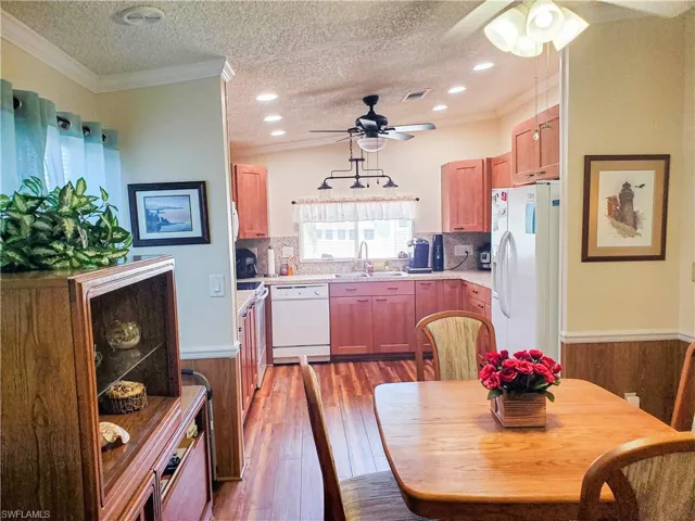 Plenty of Room for Company in the Open Dining Room and Kitchen.