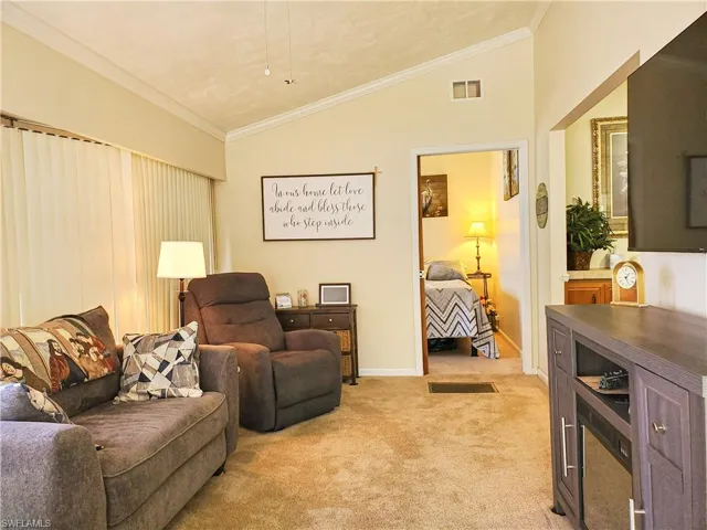 Cathedral Ceilings in this Spacious Living Room.