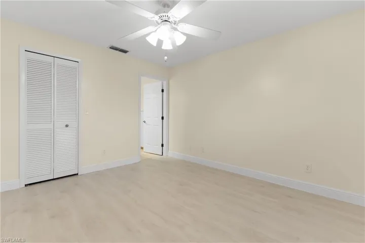 Second Bedroom- has new luxury vinyl plank flooring, new baseboards & freshly painted neutral wall color.