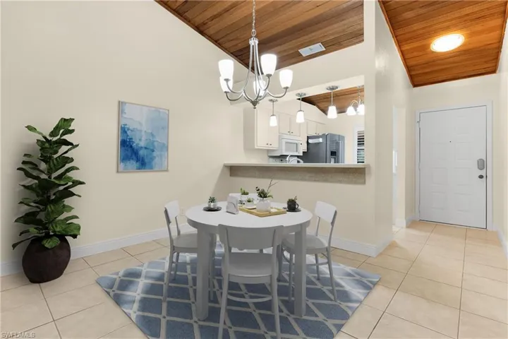 Tastefully virtually staged dining area of Villa!