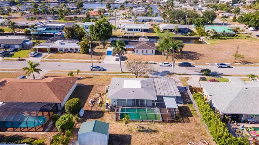Drone / aerial view featuring a residential view and a water view