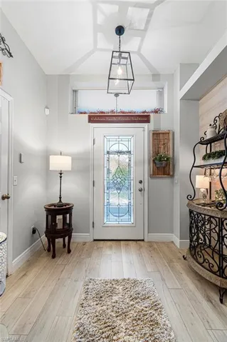 Foyer featuring light wood-style floors