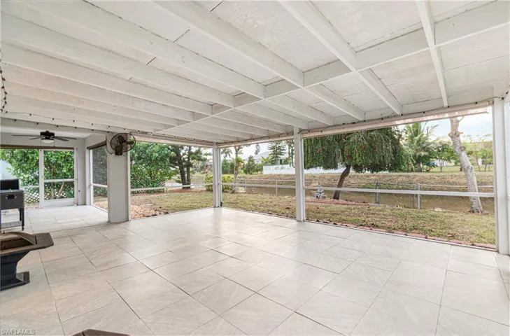 View of patio / terrace featuring ceiling fan and a grill