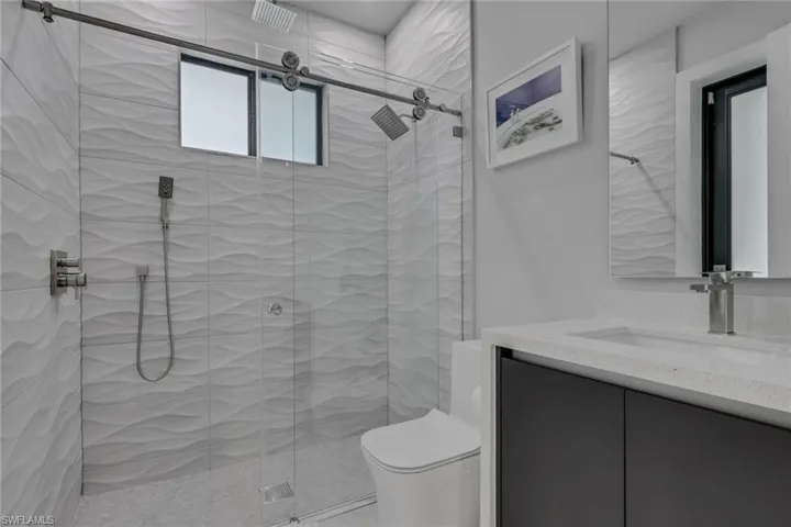 ensuite bathroom, doubling as the pool bath