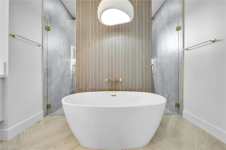 Bathroom with independent shower and bath