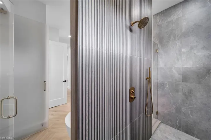 Bathroom with a shower with shower door
