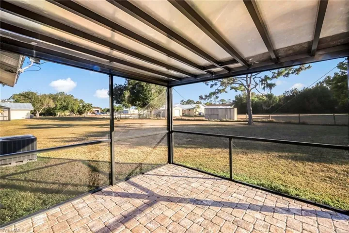 Screened lanai with pavers on Guest house.
