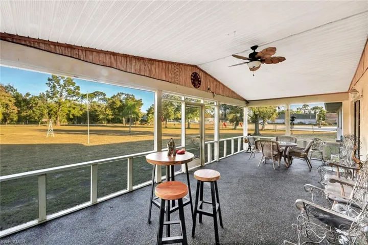 Screen porch on front of main house.