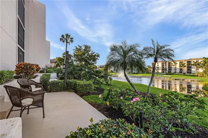 walk out patio overlooking lake/course