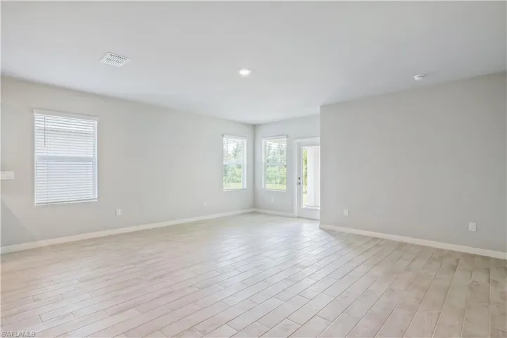 Empty room featuring light hardwood / wood-style floors