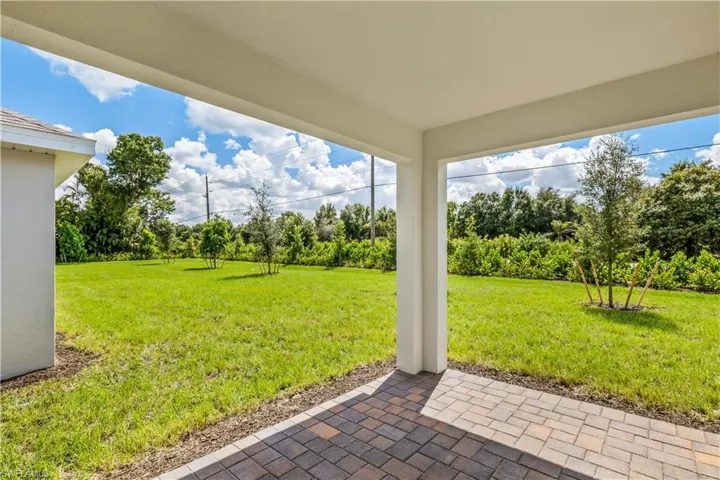 View of yard with a patio area