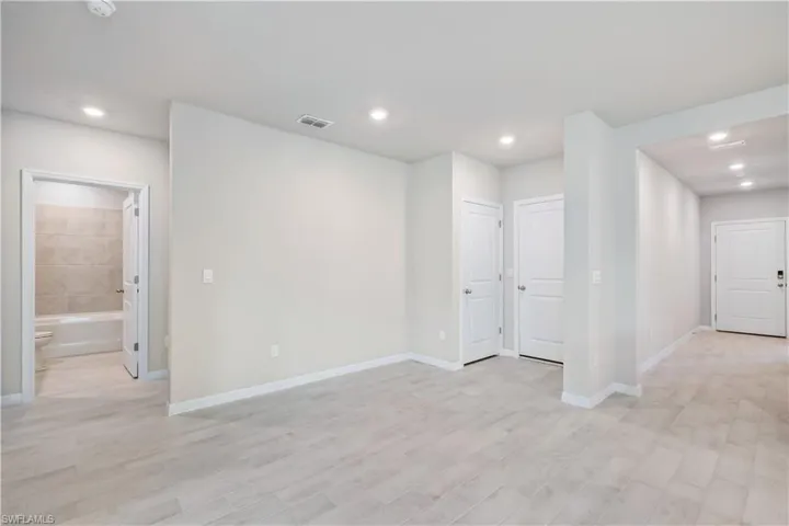 Empty room with light wood-type flooring
