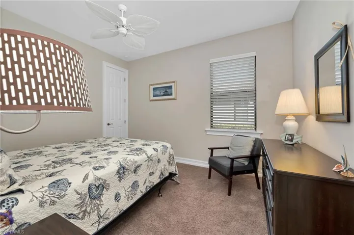 2nd bedroom with ceiling fan