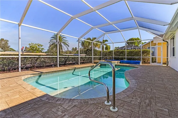 View of patio / terrace featuring ceiling fan, grilling area, and glass enclosure