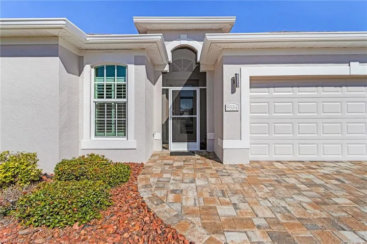 View of front of home featuring a garage