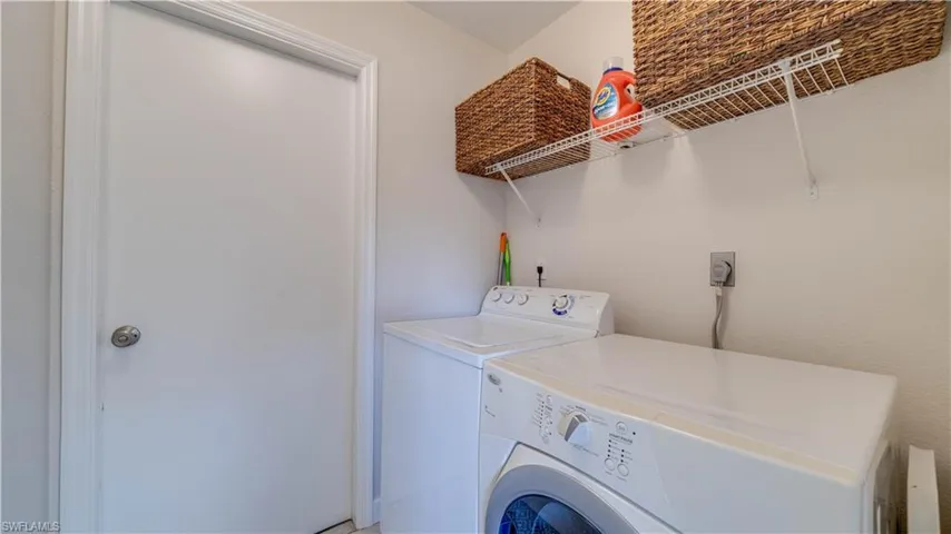 Washer and Dryer is included in the sale.  Door leads to the two car garage.