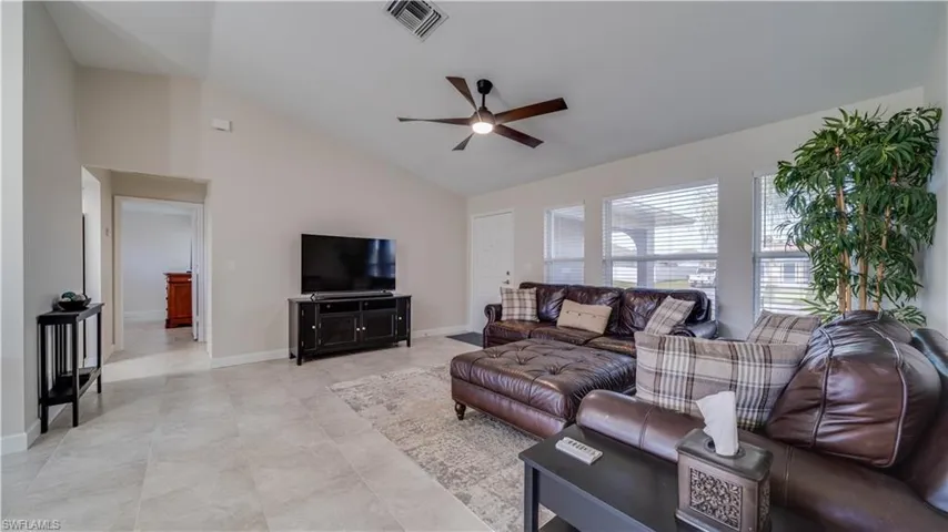 Nice size Great Room with tiled floors and fresh paint.. .